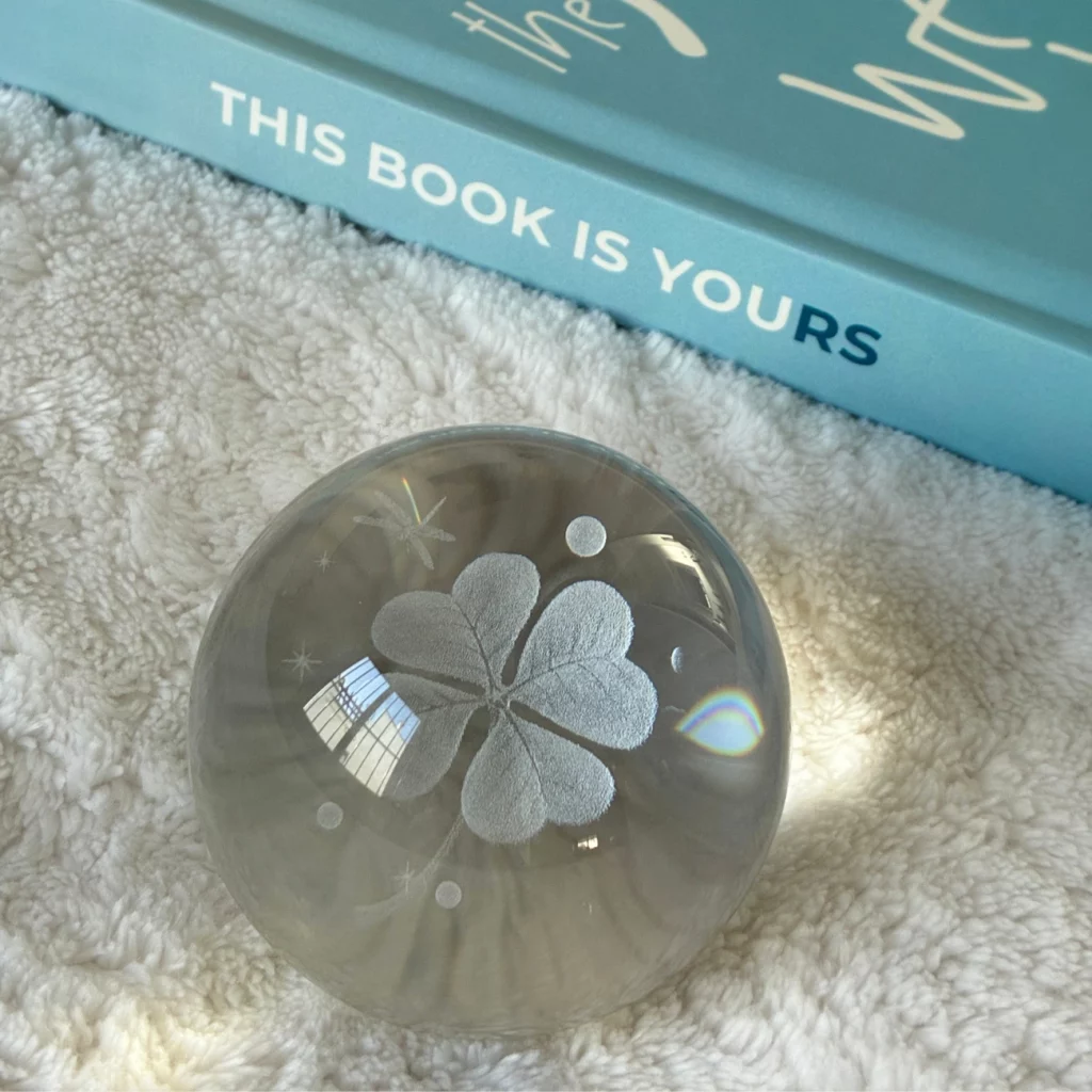 The spine of The Stage(s) We Build by Pa3: This book is YOURrs, and her signature clover sphere