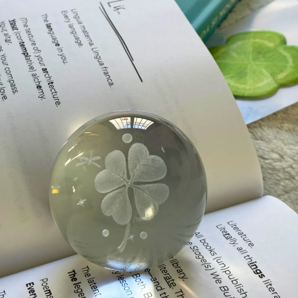 Pa3's signature clover sphere with The Stage(s) We Build book