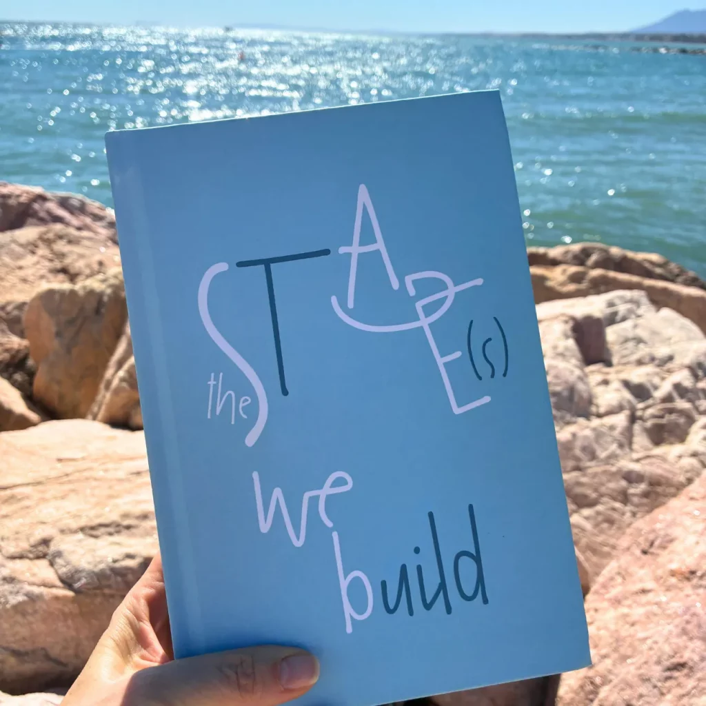 The Stage(s) We Build book by pa3, on the beach