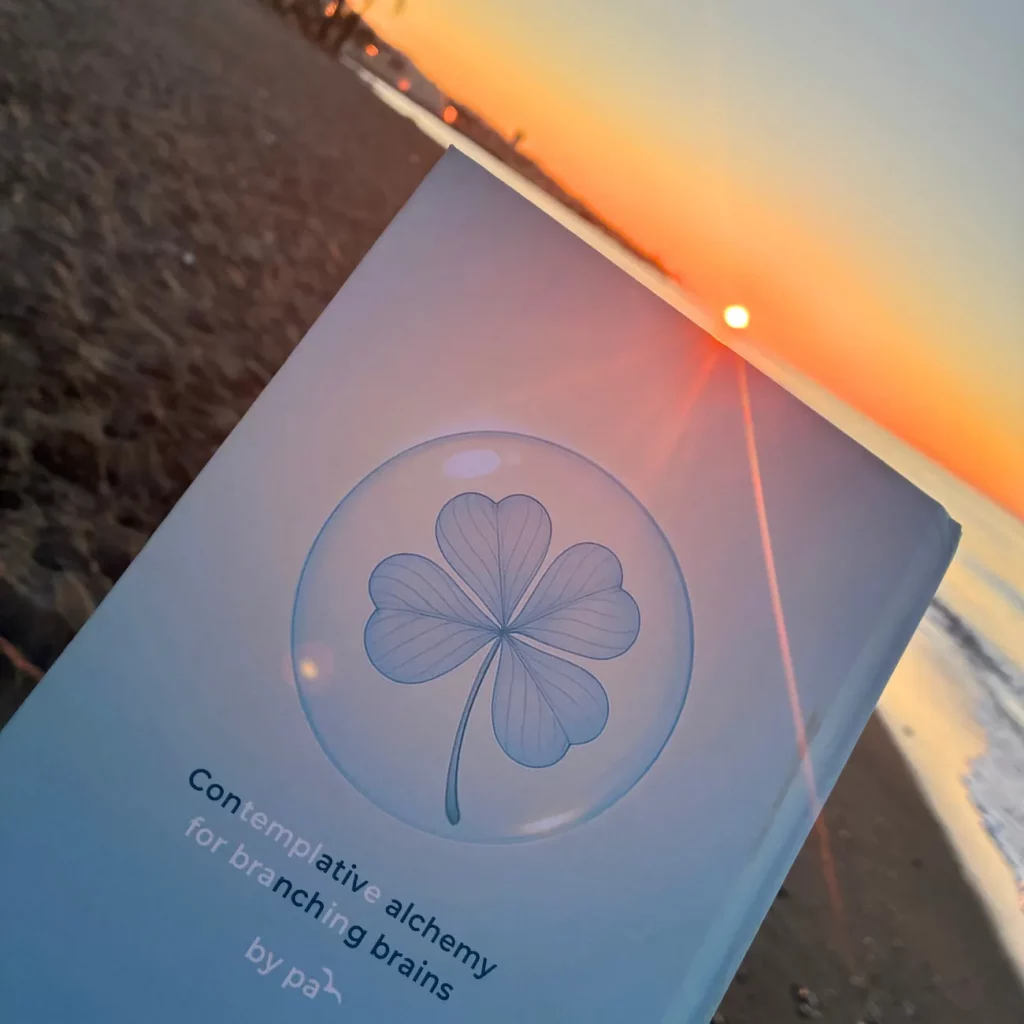 Sunrise on the beach with The Stage(s) We Build